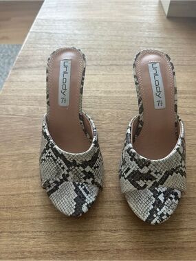 UniLady Snake-Print Slide Mules in Neutral 3 1/2” from top to bottom of heel